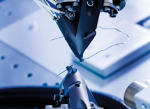 SureSmile Robotic Arm Customizing Braces Archwire